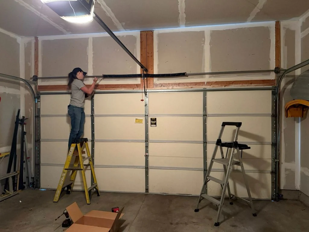 Pronto technician installing a residential garage door